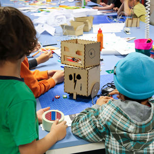 children in robotics workshop